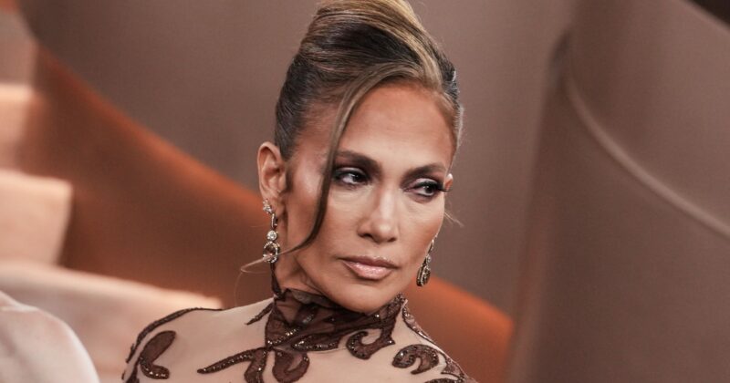 First Look: Jennifer Lopez and Brett Goldstein Shine in Netflix's Edgy Romantic Comedy 'Office Romance'