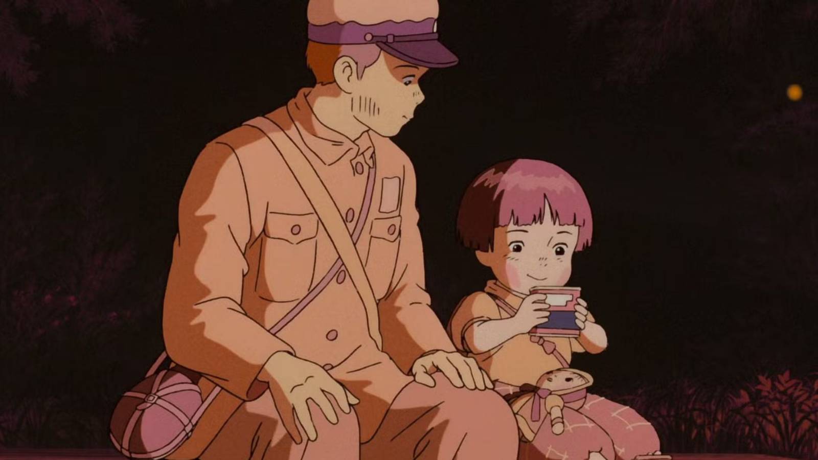 Seita sentado con Setsuko en La Tumba de las Luciérnagas